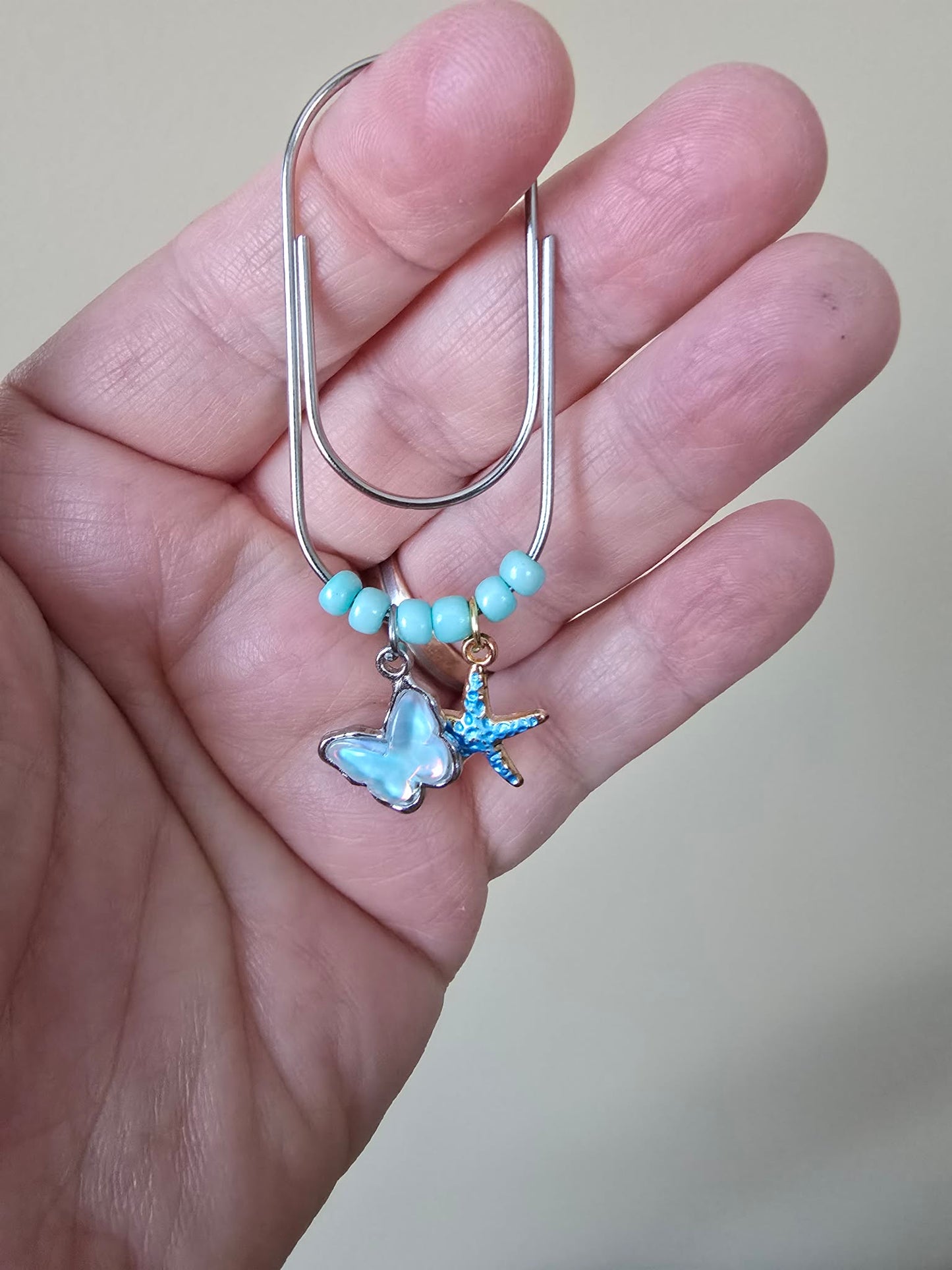 Trombone pendentif " Papillon & étoile"