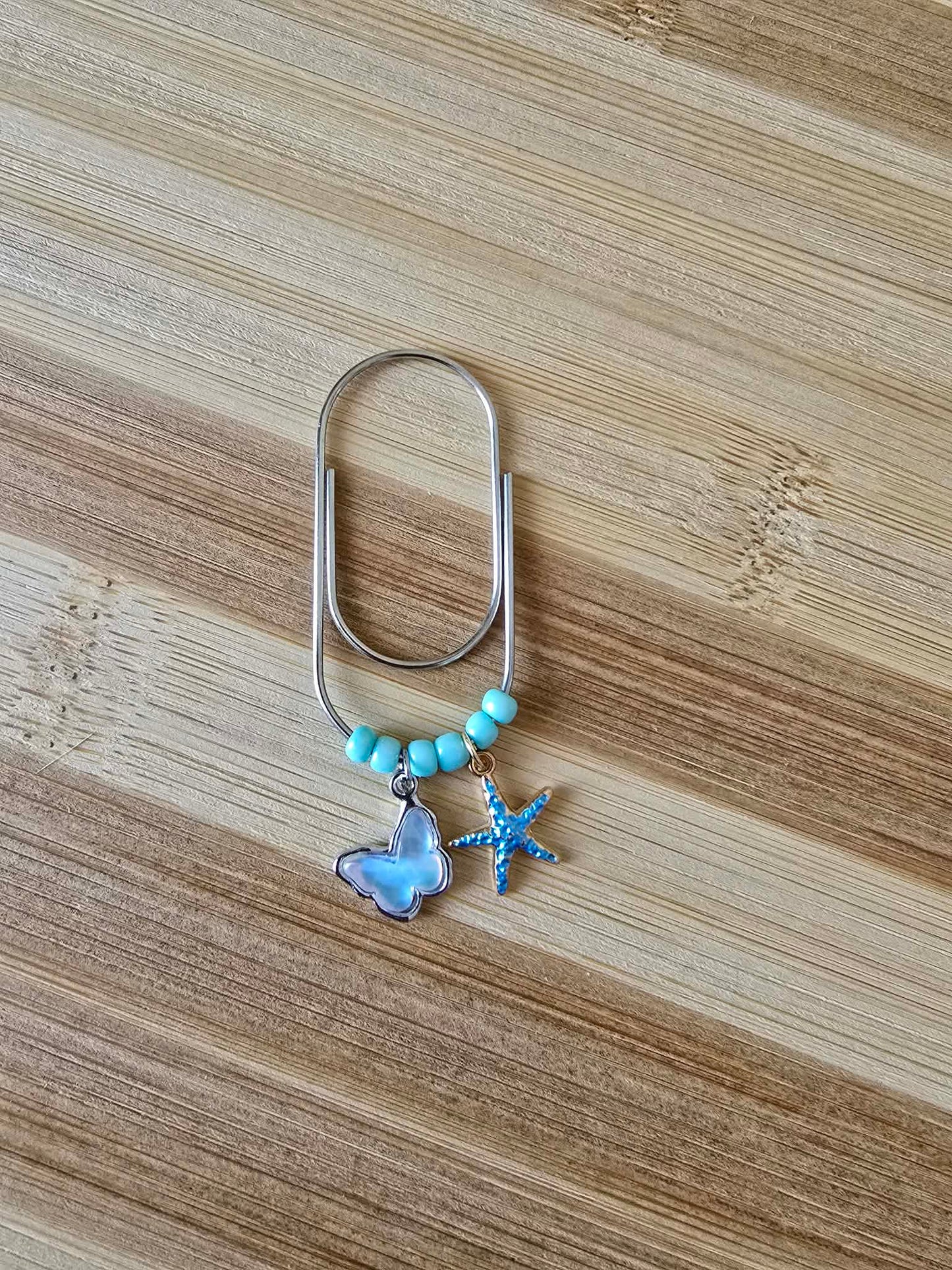 Trombone pendentif " Papillon & étoile"