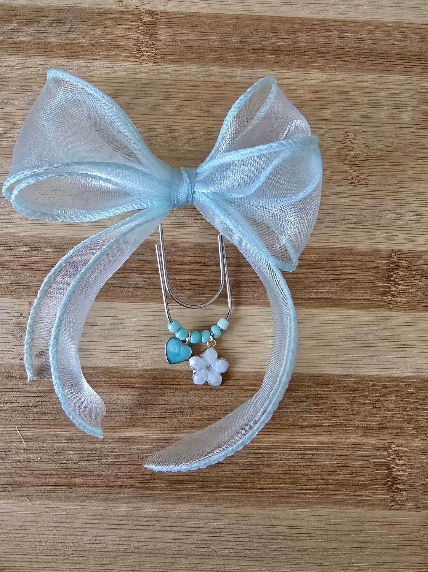 Trmbone pendentif avec neoud en tule